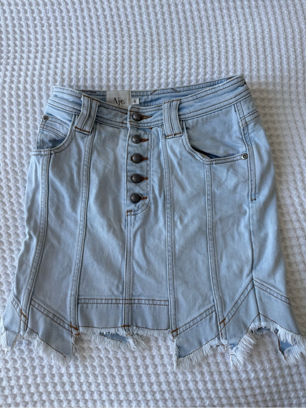 Aje Light Blue Button-Front Distressed Denim Mini Skirt
